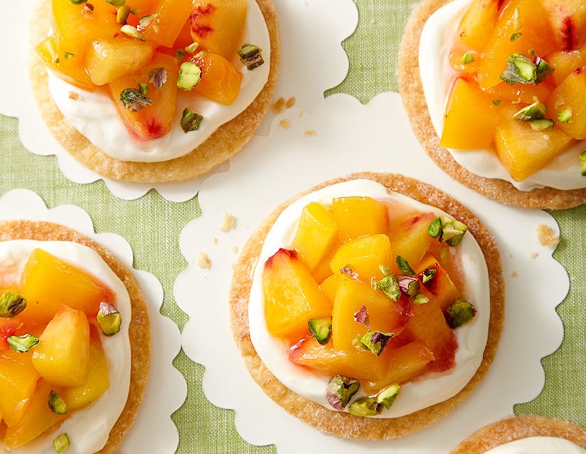 easy peach tarts with fresh cream and pistachios