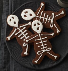 Plate full of Halloween Skeleton Cookies