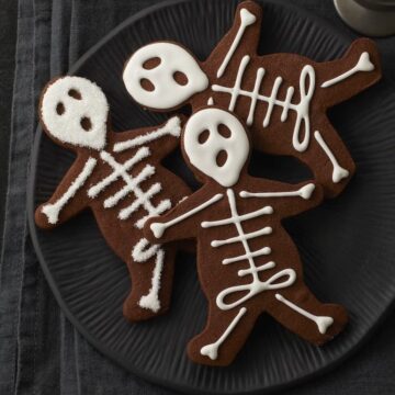 Plate full of Halloween Skeleton Cookies