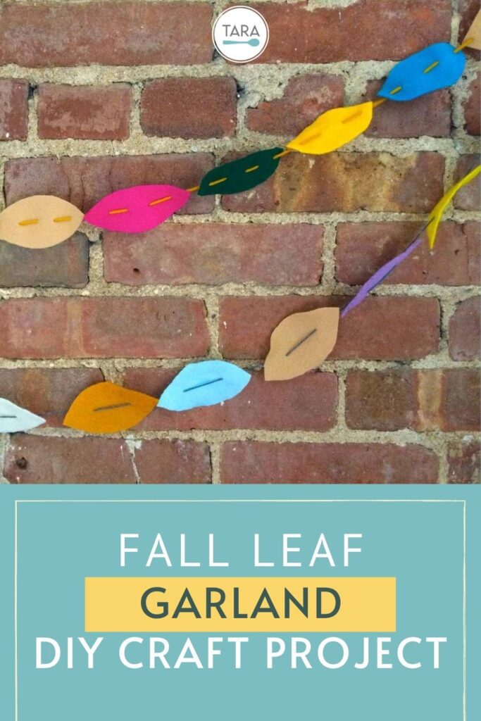 fall leaf garland made with felt on brick wall