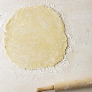 perfect pie crust rolled on white surface