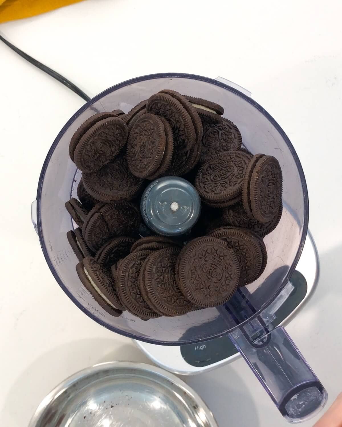 Oreo cookies in a food processor.