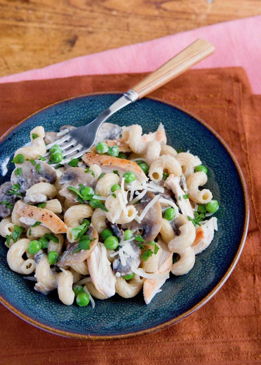 pasta with mushrooms and chicken on linen