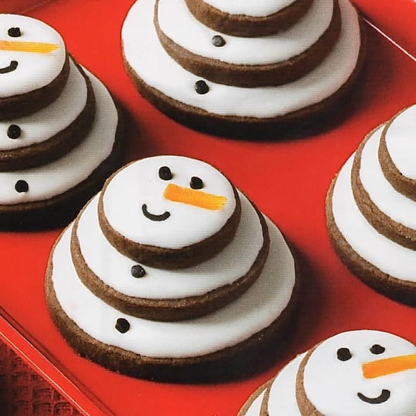 Chocolate Snowman cookies on red plate