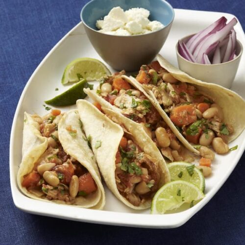 4 Low-Fat Slow Cooker Carnitas Tacos on plate