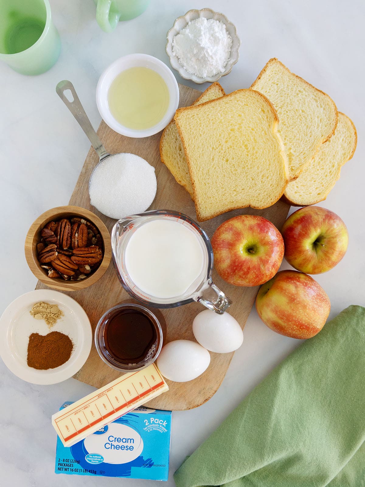 Ingredients needed to make Apple cream cheese stuffed French toast.