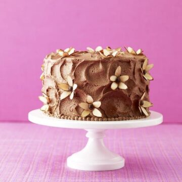 Almond Flower Cake with milk chocolate frosting and almond flowers