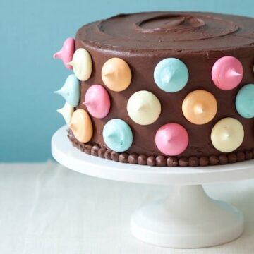 Polka Dot Cake with chocolate frosting and meringue kisses