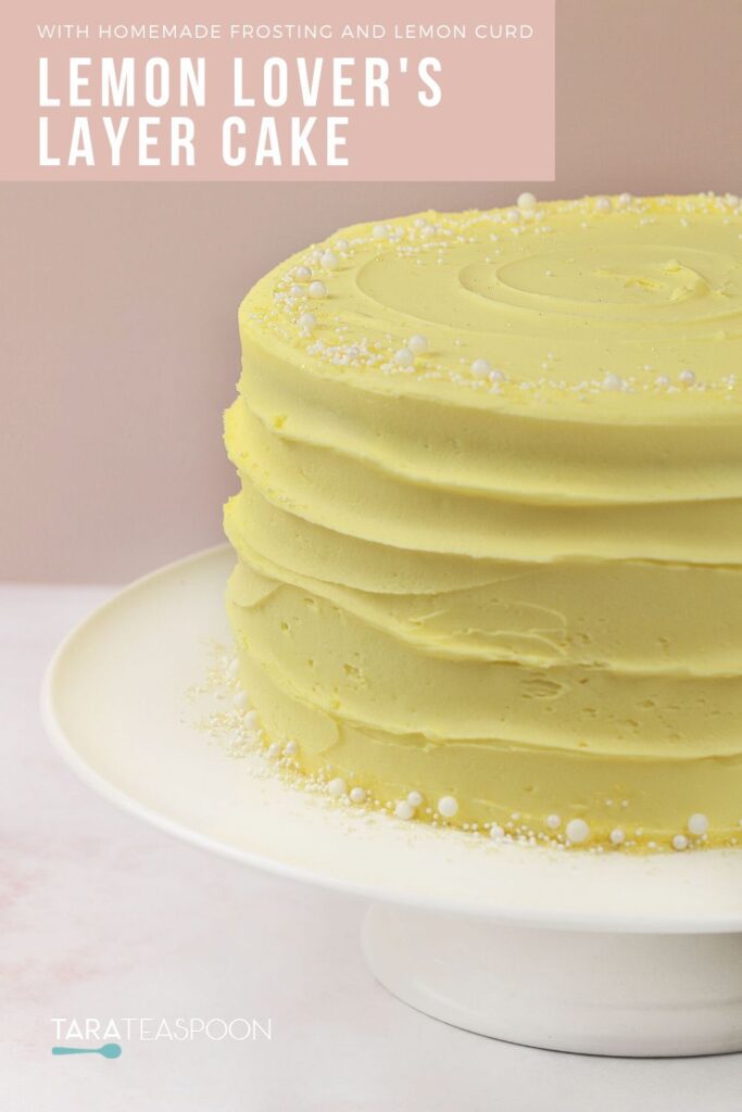 lemon layer cake on white pedestal pin
