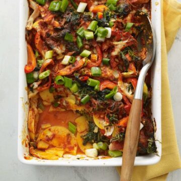 Chicken enchilada bake with polenta in white baking dish