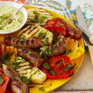 sausage and peppers with pineapple and avocado recipe image