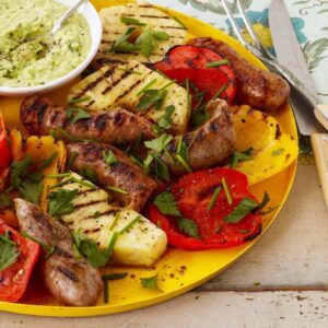 sausage and peppers with pineapple and avocado recipe image