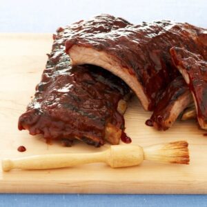 3 ingredient ribs on cutting board with brush