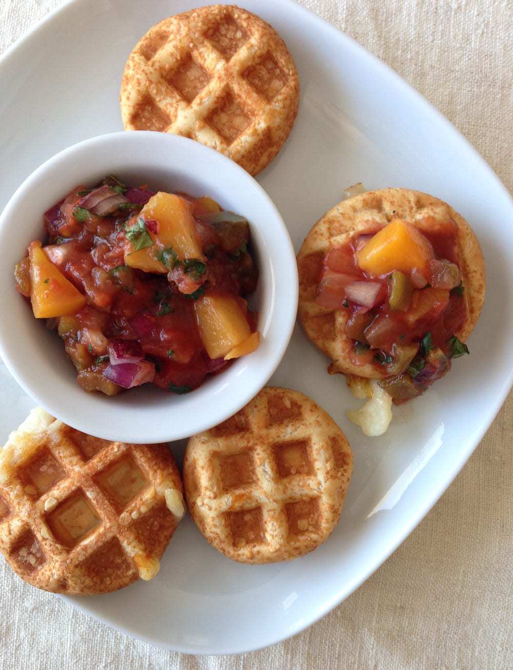 Mozz Waffle Bites w salsa on white plate