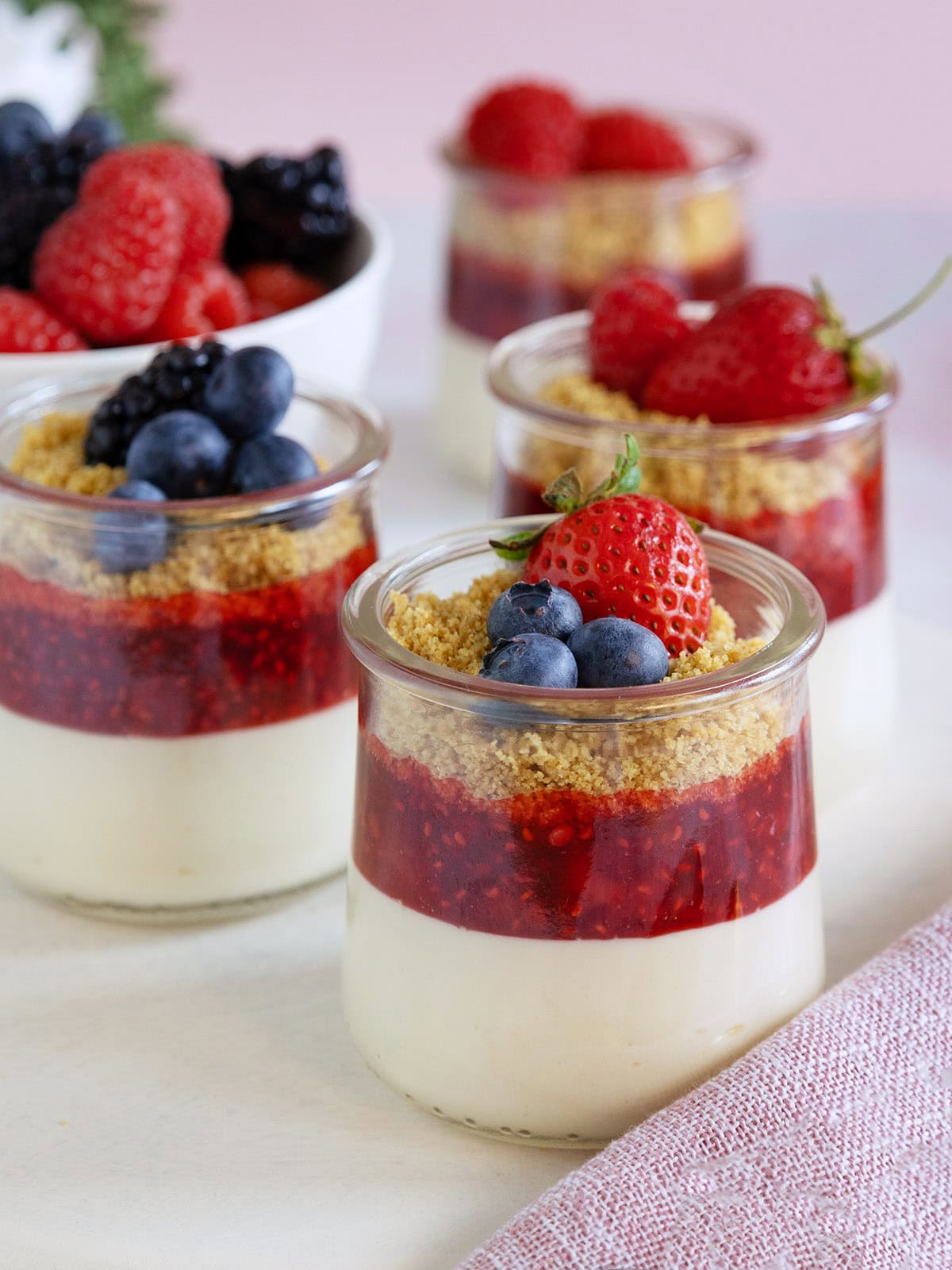 Close up of mini cheesecake jars.
