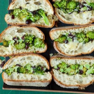 Close of Roasted broccoli melt slices on tray