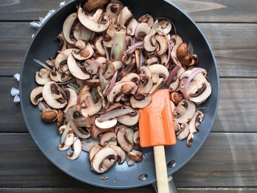 Easy Parmesan Mushroom Gnocchi mushrooms and onions in a skillet