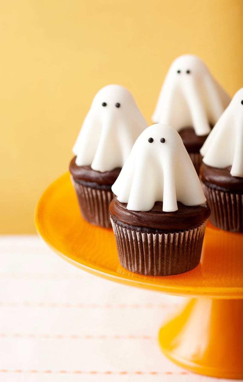 floating ghost cupcakes on yellow