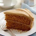 Creamy Caramel Icing on a slice of Classic Spice Cake