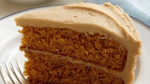 Creamy Caramel Icing on a slice of Classic Spice Cake