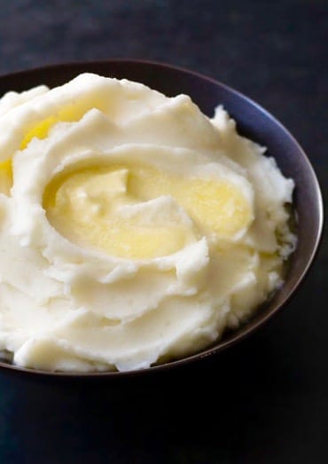 Fluffy Mashed Potatoes are as simple to make as they are delicious!
