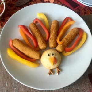Mozzarella Sticks Turkey Snacks with red orange and yellow pepper slices