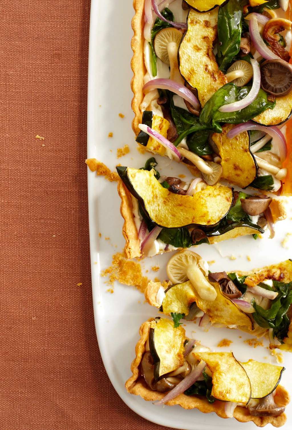 mushroom-squash-tart on white platter
