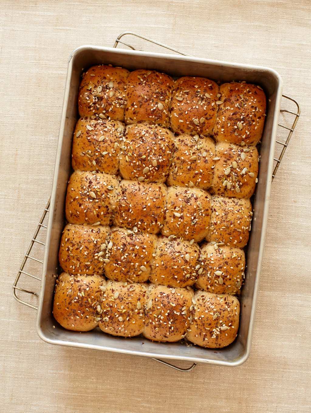 Dinner Rolls with Savory Seed Topping in baking pan