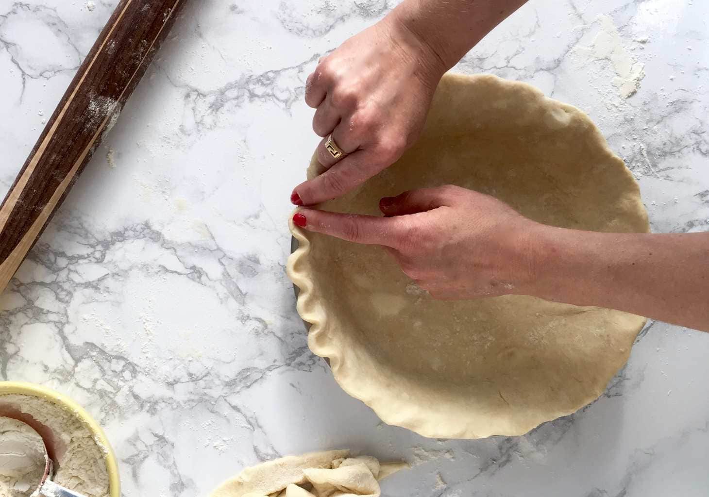 Rolling the perfect pie crust crimping.