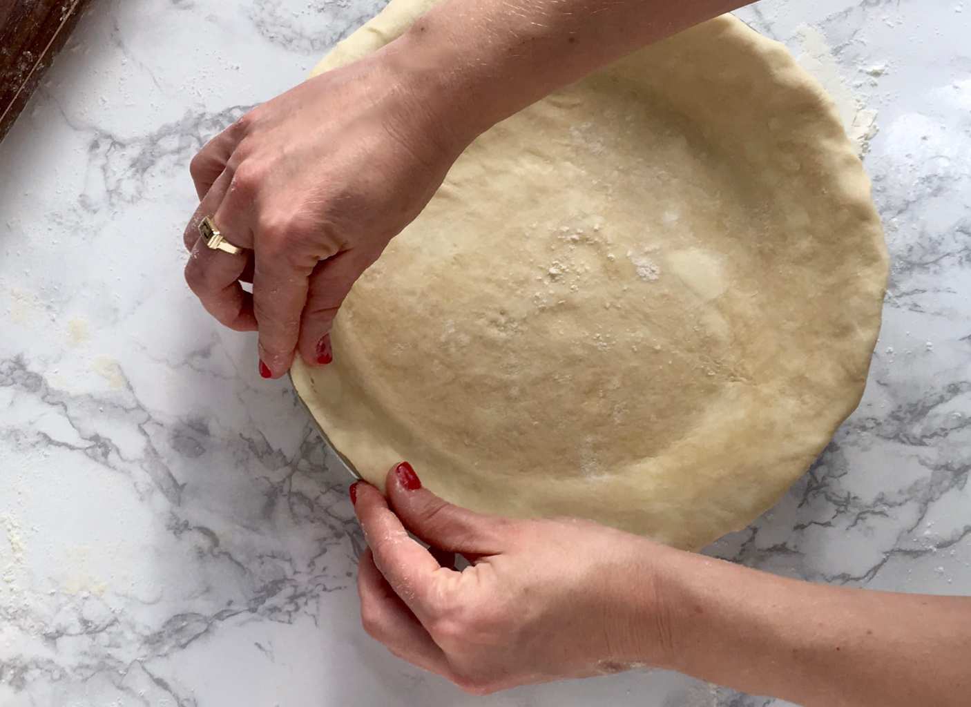 Rolling the perfect pie crust folding under edge