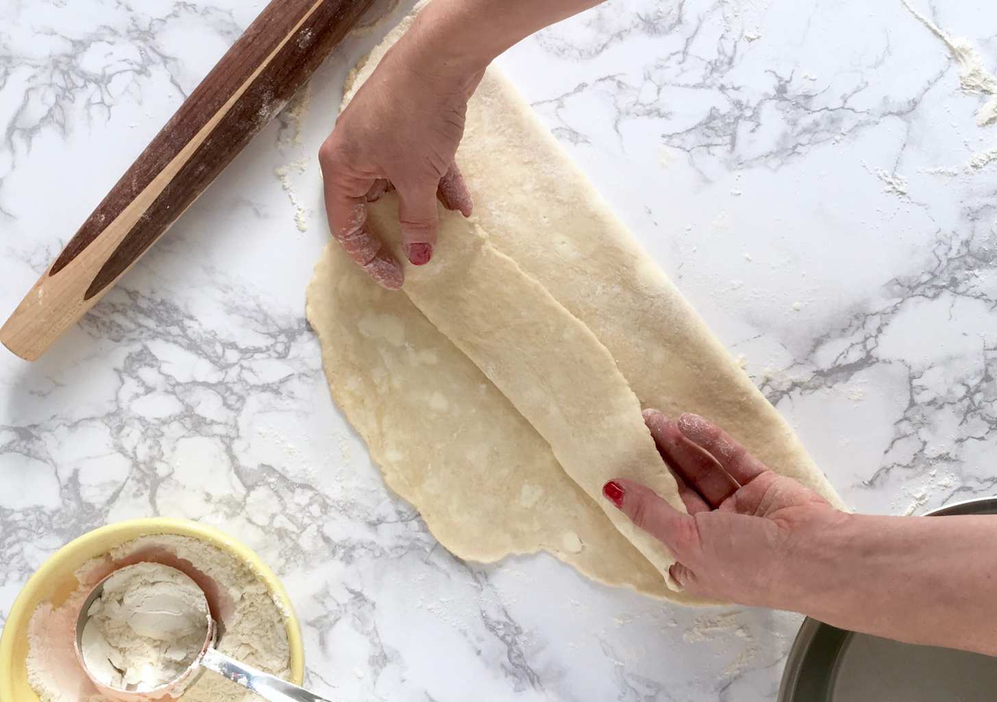 Rolling the perfect pie crust folding in half