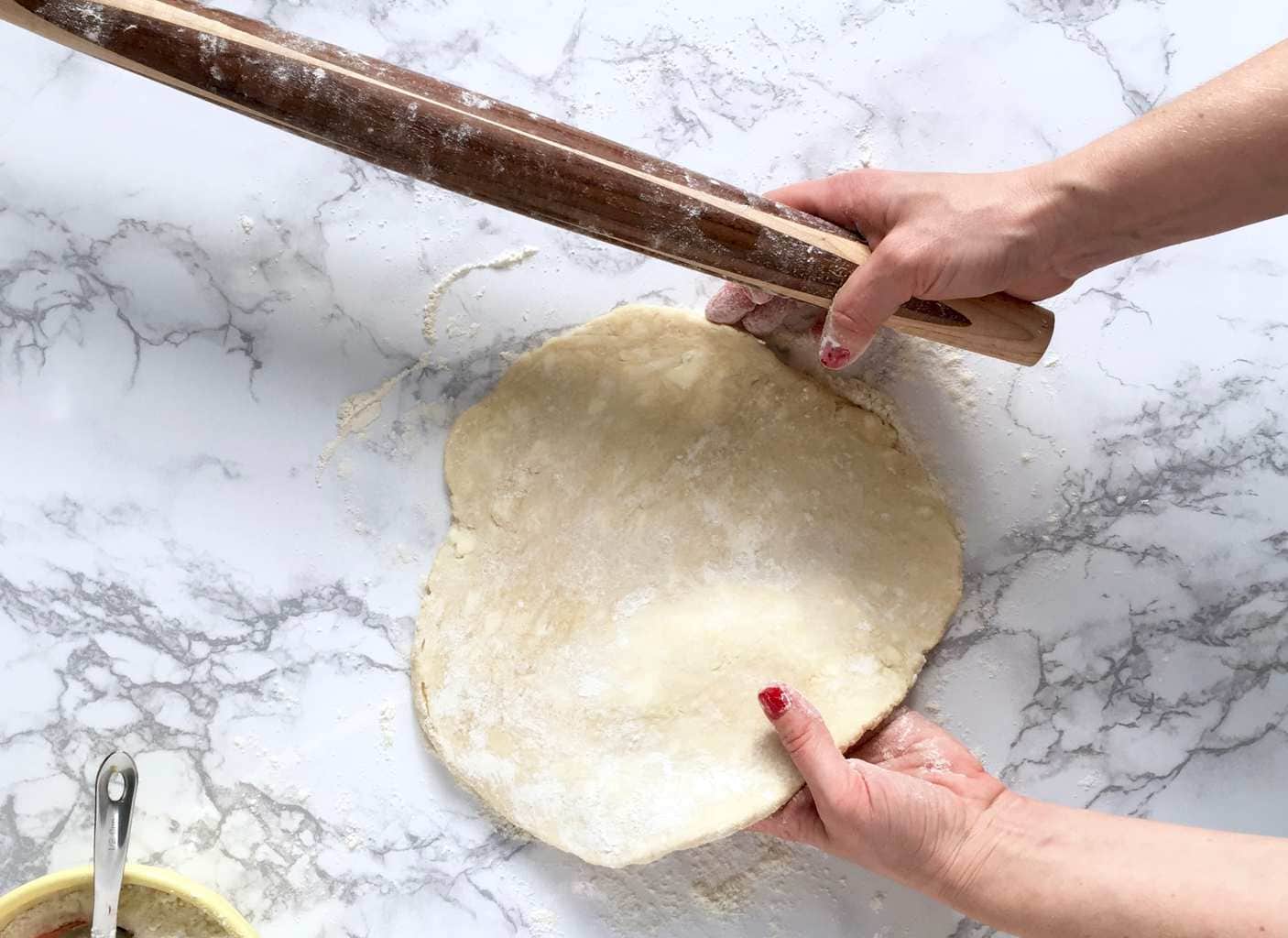 Rolling the perfect pie crust turning dough