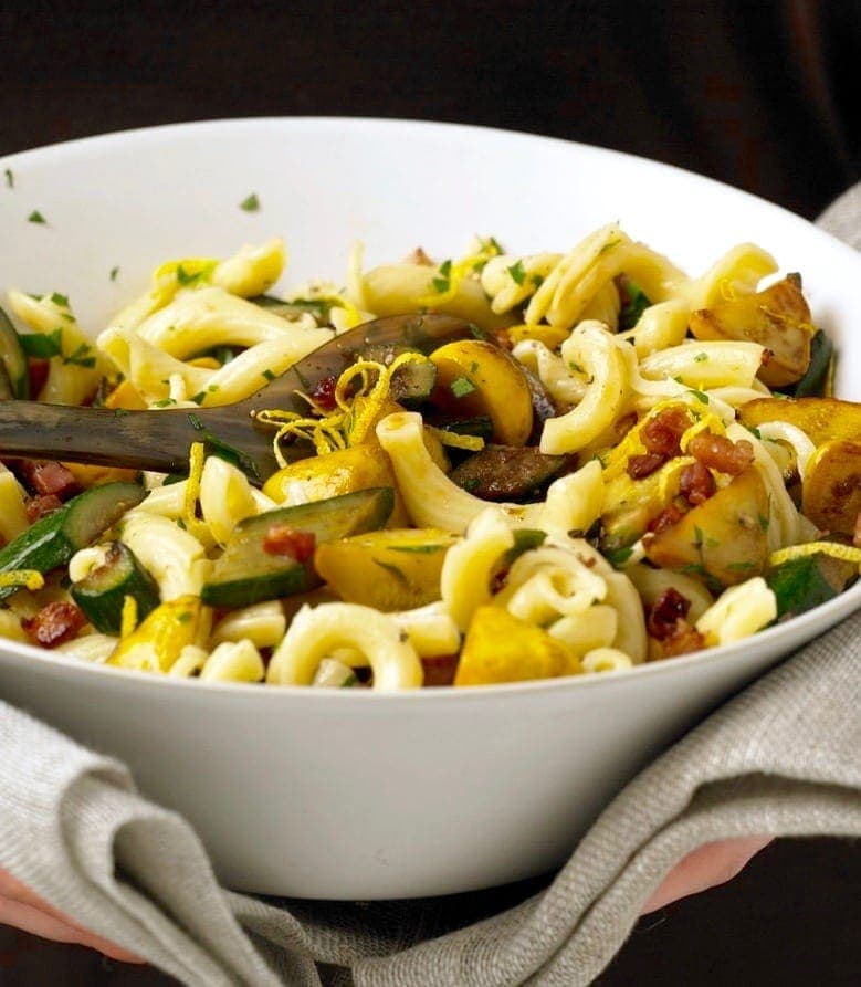 Squash and Pancetta pasta Close crop in white bowl