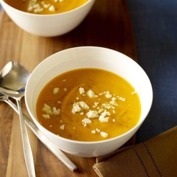 Two bowls of Chipotle Sweet Potato Soup with Queso Blanco