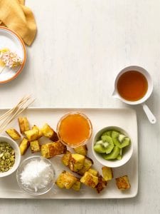 Oven baked French toast fondue makes a brunch much more fun and delicious.