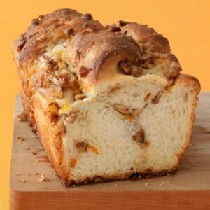 Close up of Orange Nut Swirl Bread wood cutting board