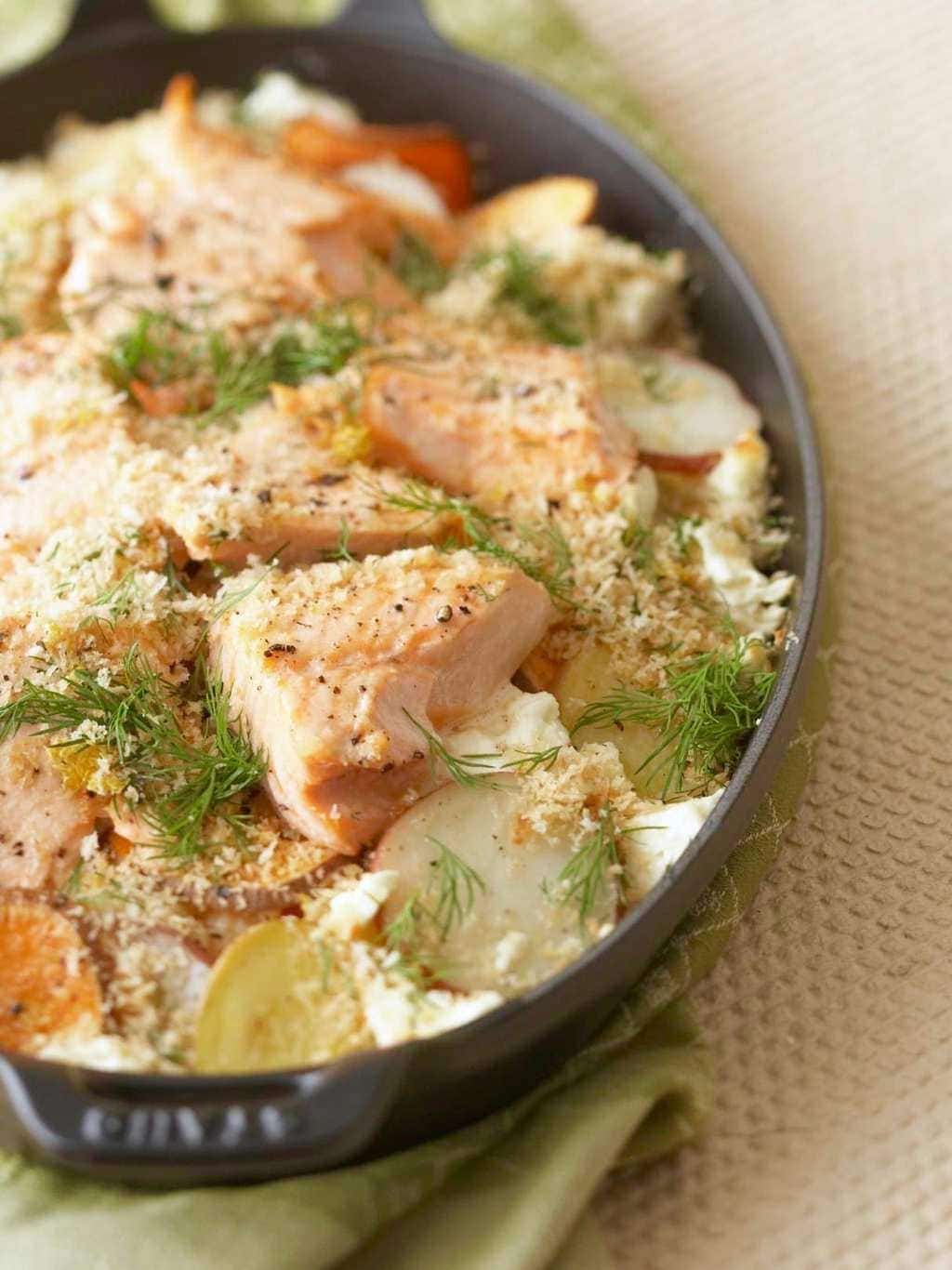 Easy Dinner Potato Salmon Bake overhead in black baking dish