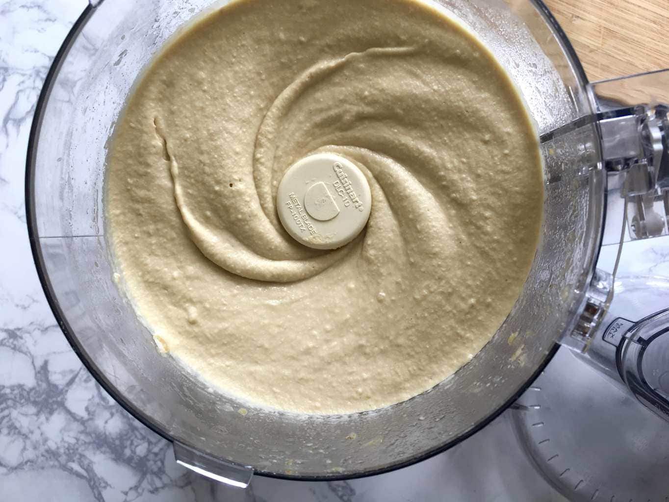 Blended hummus in food processor