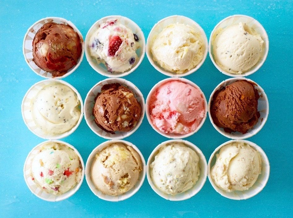 24 easy homemade ice cream flavors in cups on turquoise background