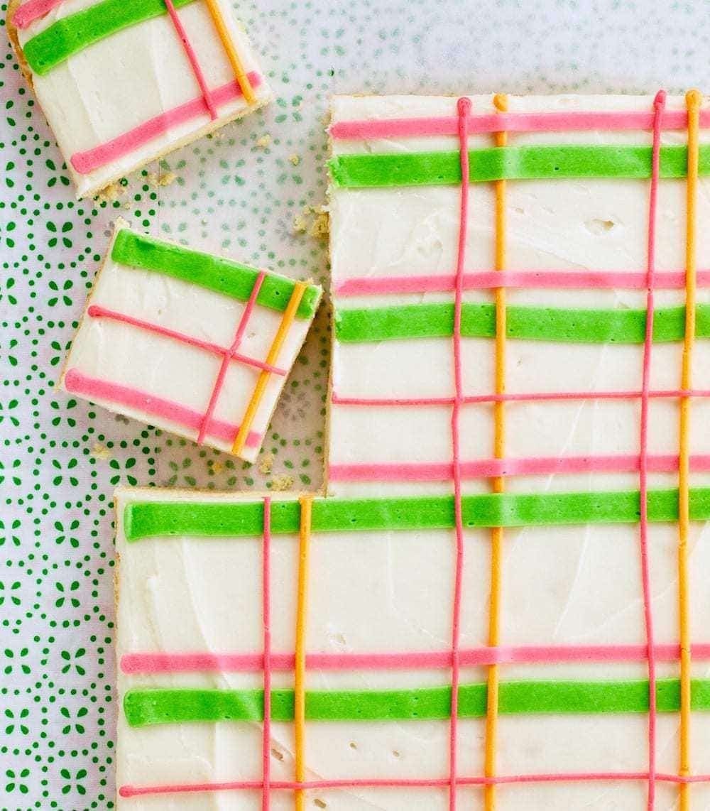 One Pan Sugar Cookie Bars on green and white background. 
