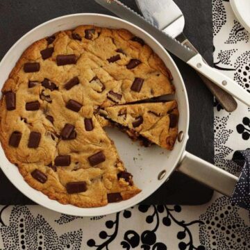 The best skillet chocolate chip cookie on black and white
