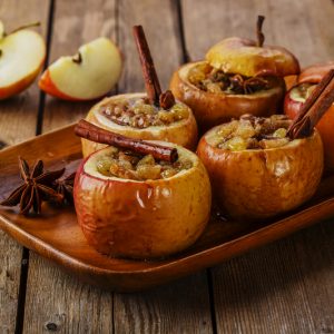 Baked Honeycrisp Apples with raisins and cinnamon sticks