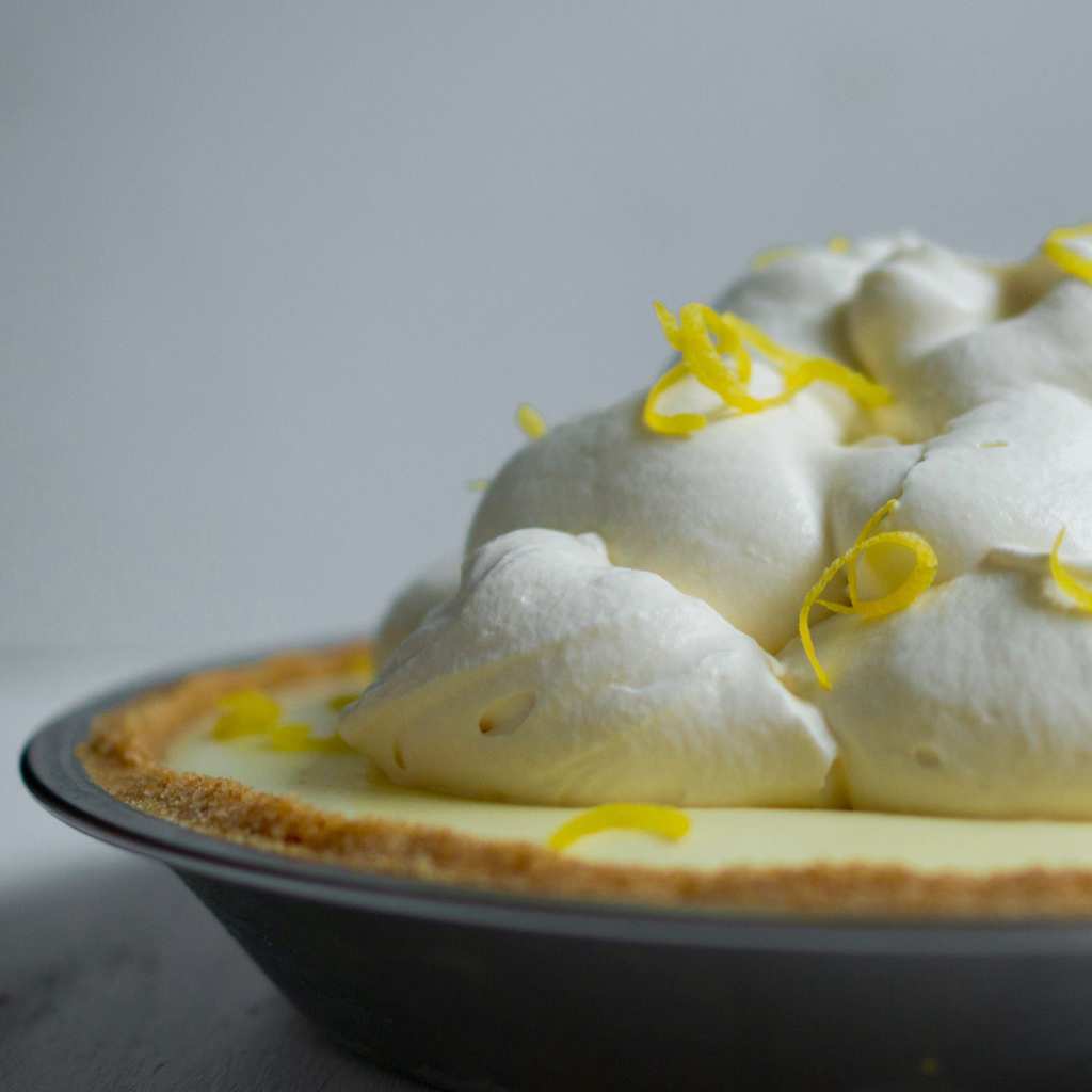 Delicious lemon no-bake icebox pie with mounds of whipped cream