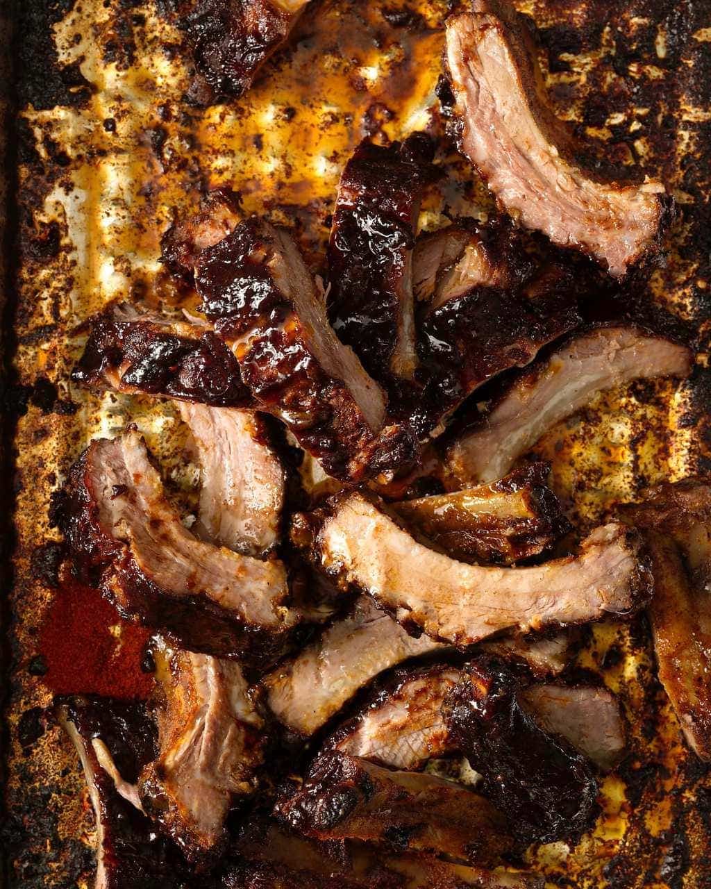 Barbecue ribs heaped and cut into individual ribs