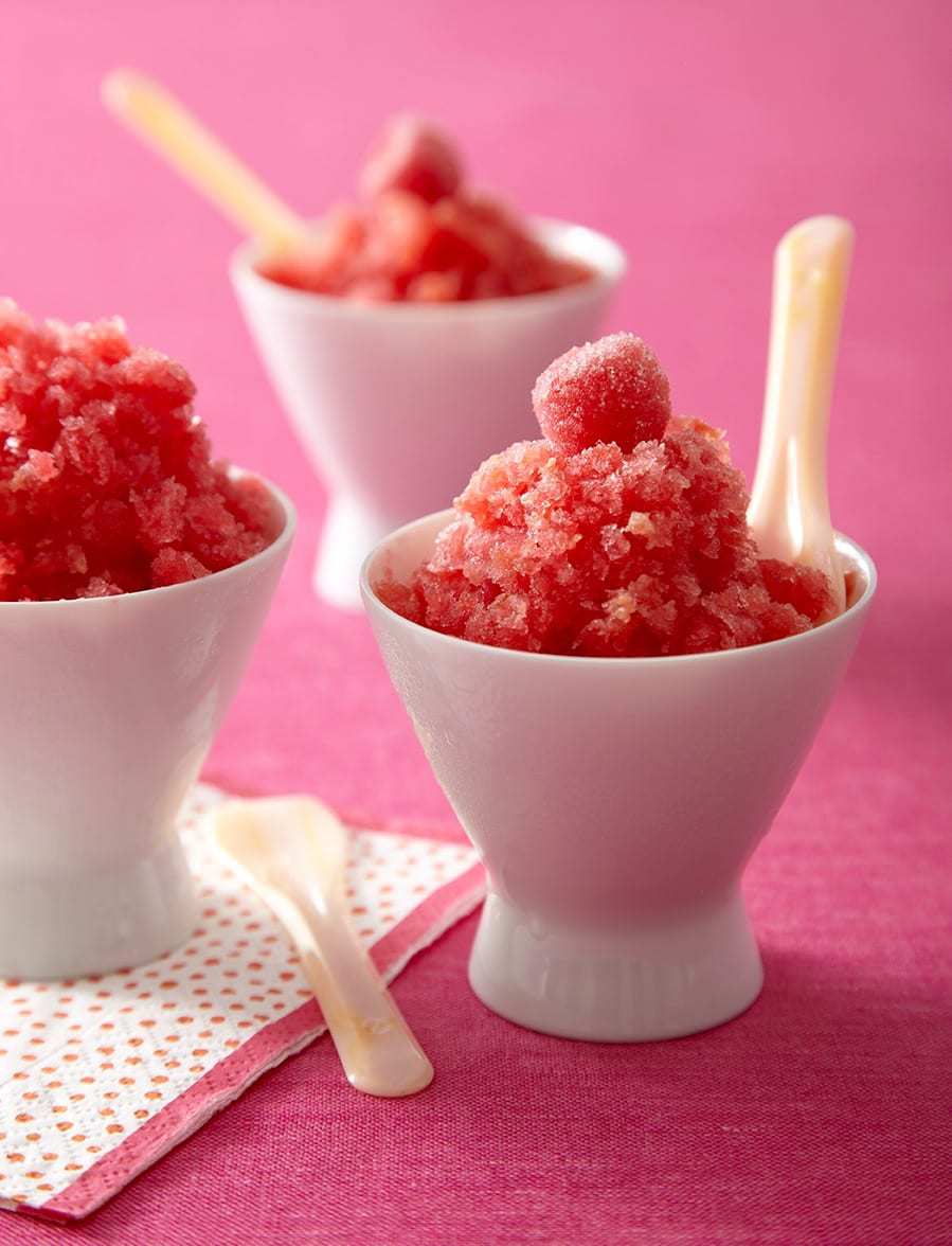 tart cherry lime granita in little white bowls on pink background