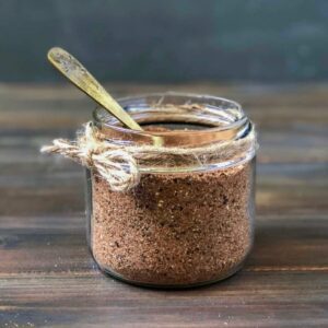 10 ingredient bbq rub in jar with spoon