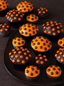 halloween cupcakes on black surface