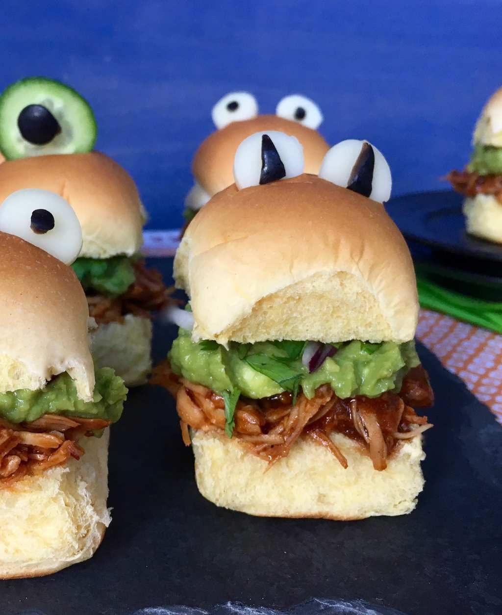 halloween monster chicken sliders with blue background