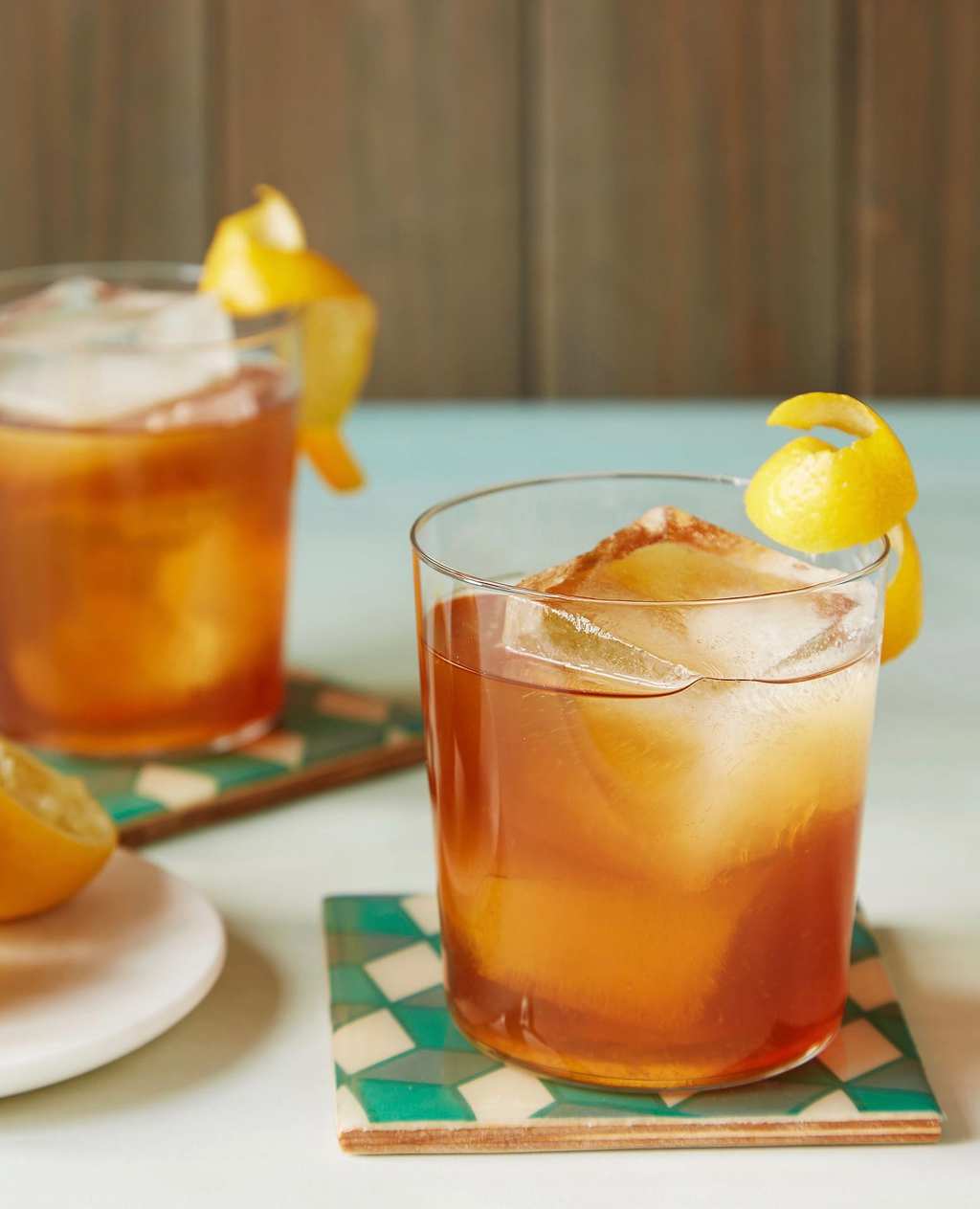 Earl Grey Tea Cocktail with lemon curl and rum