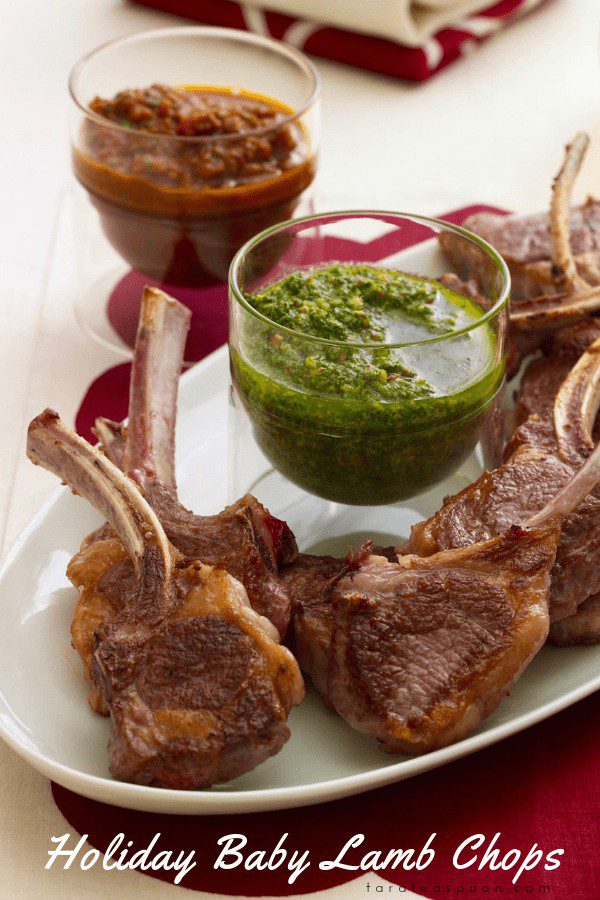 Baby lamb chops appetizer with red and green sauces